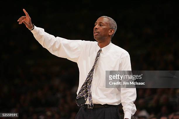 Head coach Louis Orr of the Georgetown University Hoyas makes a call against the Seton Hall Pirates during round one of the Big East Men's Basketball...
