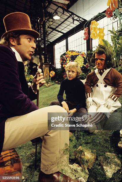 Gene Wilder, Peter Ostrum and unknown actor dressed as an Oompa Loompa in the film 'Willy Wonka & the Chocolate Factory', 1971.