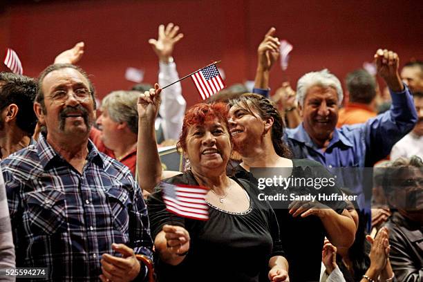 People from around the world cheer after becoming U.S. Citizens during a Naturalization Ceremony in San Diego, California on Wednesday, September 19,...