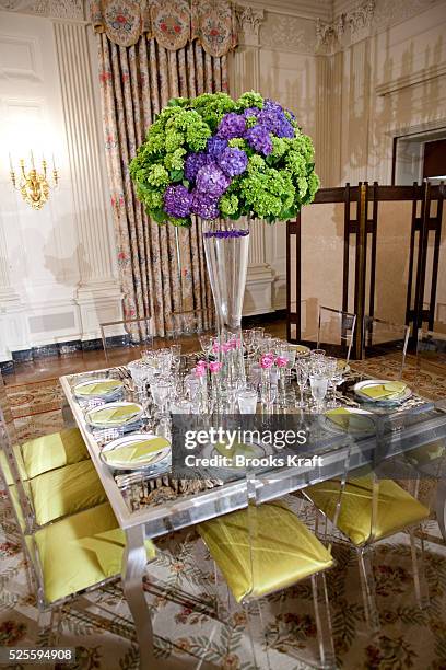 Table settings in the State Dining Room of the White House in Washington, ahead of a State Dinner hosted by President Barack Obama and first lady...