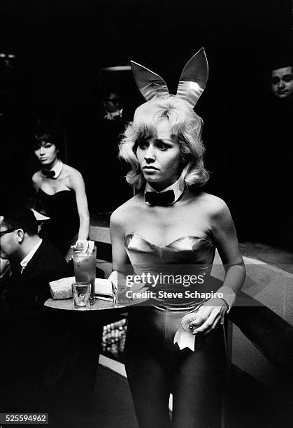 Waitress at the Playboy Club in New York in her so-called bunny outfit