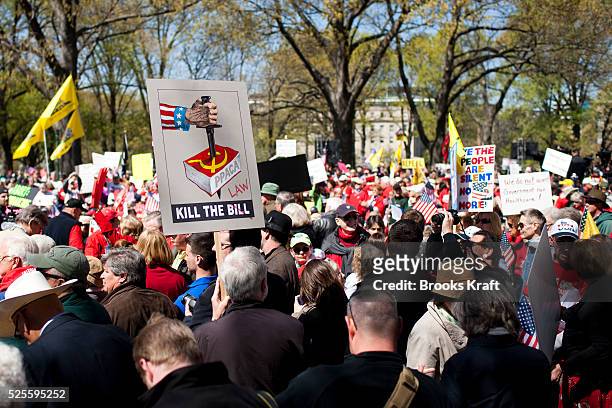 Members and supporters of the Tea Party hold a rally calling for the repeal of President Obama's 2010 healthcare Affordable Care Act, on Capitol Hill...