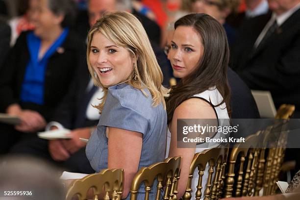 The daughters of Former President George W Bush, Jenna and Barbara, attend the unveiling of their parents' official portraits at a White House...