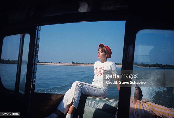 Portrait of French pop musician and actress Francoise Hardy as she sunbathes on a boat, Venice, Italy, September 1966.