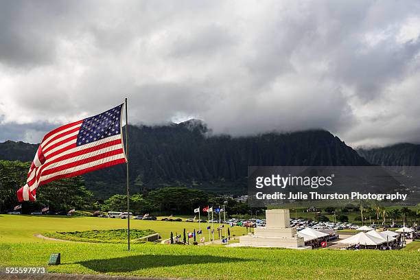 American Flag and Lei Filled Patriotic Veteran's Day Ceremony at the Hawaii Veteran's Cemetery in Kaneohe, Hawaii on the Island of Oahu, U.S. All...