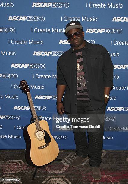 Record producer Warryn Campbell poses with a #StandWithSongwriters guitar, which will be presented in May to members of Congress to urge them to...