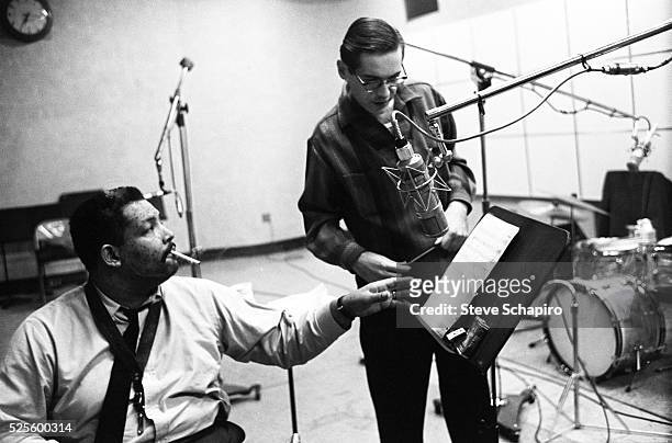 Cannonball Adderley and Bill Evans during a recording session