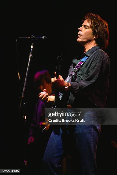 Bob Weir of rock group The Grateful Dead performs on stage during a concert.