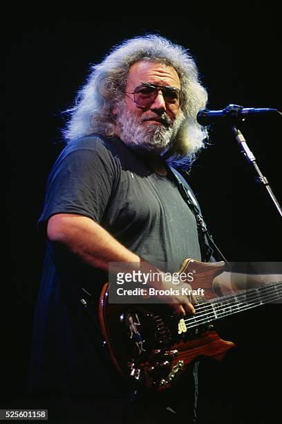 Jerry Garcia, lead guitarist for rock group The Grateful Dead, performs on stage during a concert.