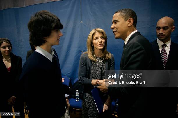 Democratic presidential hopeful Senator Barack Obama greets Caroline Kennedy Schlossberg, daughter of the late president John F. Kennedy, and her son...