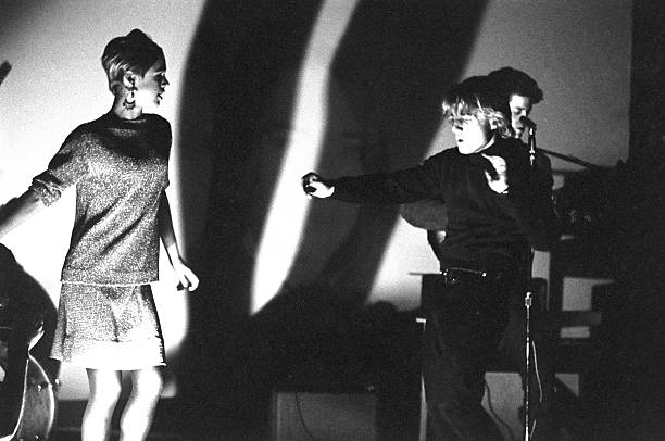 Edie Sedgwick. Gerald Malanga and Lou Reed performing with The Velvet Underground during the Exploding Plastic Inevitable tour
