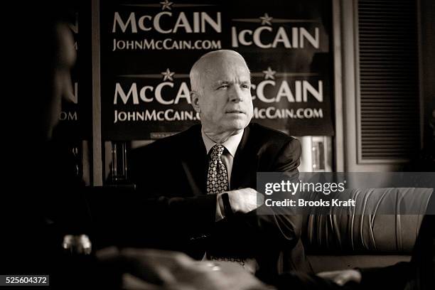 Republican presidential hopeful Senator John McCain on his campaign bus on the way to campaign event in New York City.