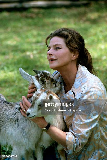 Swedish actress Ingrid Bergman with two goats in a scene from the film 'A Walk in the Spring Rain,' directed by Guy Green, USA, 1970.