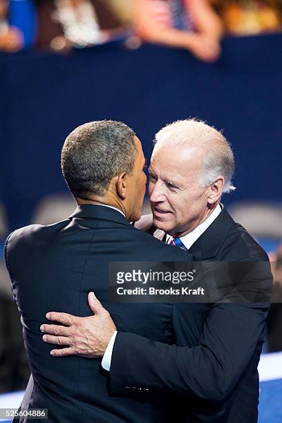 President Barack Obama is joined on stage by U.S. Vice President Joe Biden at the conclusion of the final session of the Democratic National...