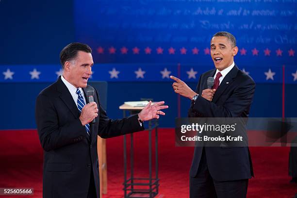 Former governor Mitt Romney and President Barack Obama at the second presidential debate of the 2012 US Presidential Election held at Hofstra...