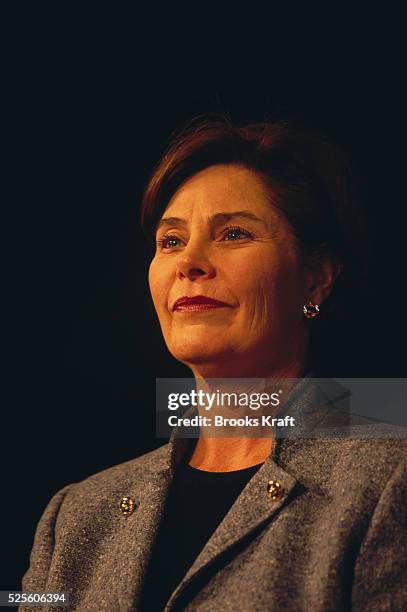 Laura Bush wearing a gray coat. She was in Milwaukee with her husband's Presidential campaign in 2000.