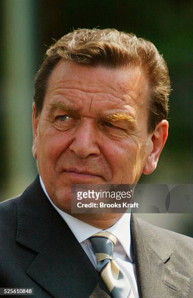 German Chancellor Gerhard Schroeder attends a joint news conference with U.S. President George W. Bush at the Bundeskanzleramt in Berlin.