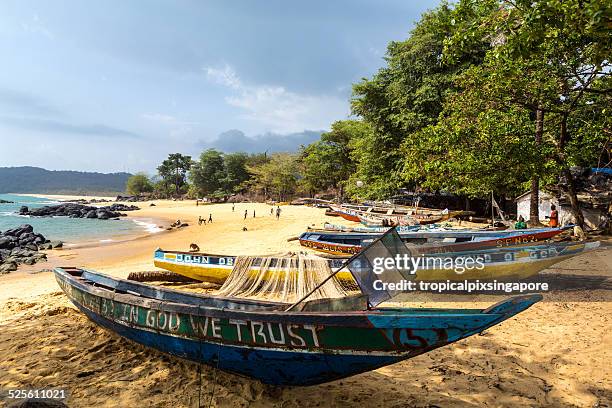 fishing boat - sierra leone beach stock pictures, royalty-free photos & images