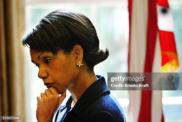 National Security Advisor Condoleezza Rice looks thoughtful after a meeting in the Oval Office of the White House. She has been talking with...