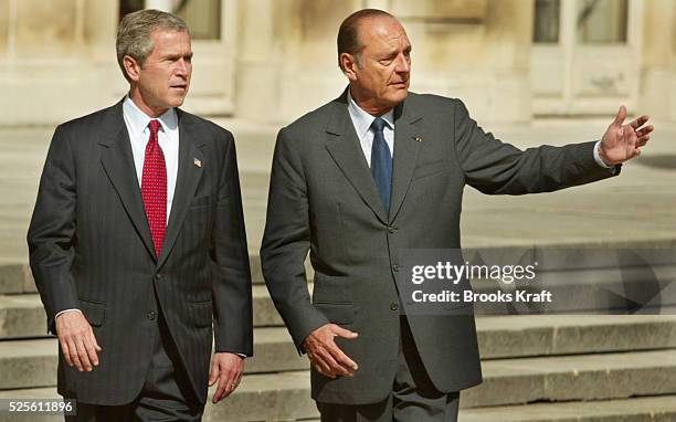 President George W. Bush and French President Jacques Chirac hold a joint news conference at the Elysee Palace in Paris. After their private meeting...