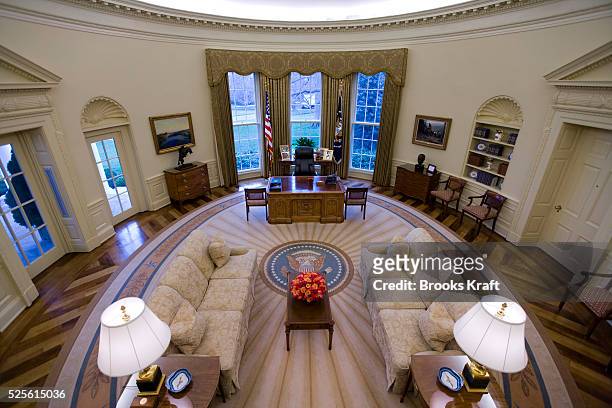 An intererior view of the Oval Office at the White House, empty of people during the George W Bush Administration. The Oval Office is the official...