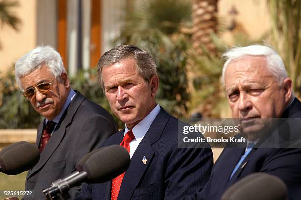 United States President George W. Bush makes statements with Israel Prime Minister Ariel Sharon and Palestinian Prime Minister Mahmoud Abbas at the...
