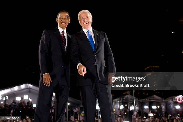 Democratic President-elect Barack Obama and his running mate, Vice-President-elect Joe Biden wave during their election night rally in Chicago.