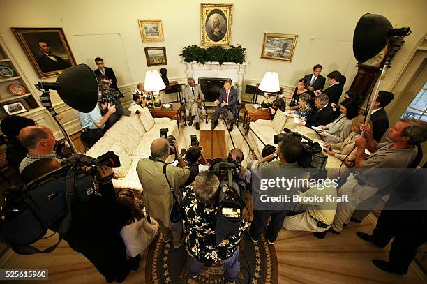 United States President George W. Bush and United Nations Secretary General Kofi Annan speak to reporters after a meeting held to discuss...