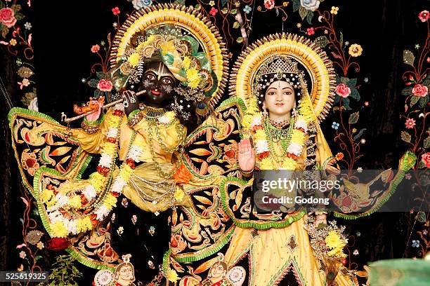 hindu statues - hindu god krishna stock-fotos und bilder