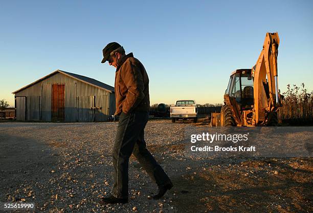 President George W. Bush takes a pensive walk around his ranch in Crawford, Texas.