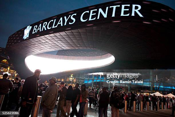 Thousands of people attend a concert by Jay Z at Barclays Center the new arena to NBA Brooklyn Nets basketball team during its opening night in...
