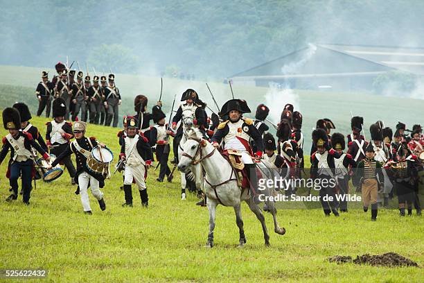 The Battle of Waterloo was re-enacted by a few hundred actors in the fields near Waterloo, where Napoleon Bonaparte and his French army were...