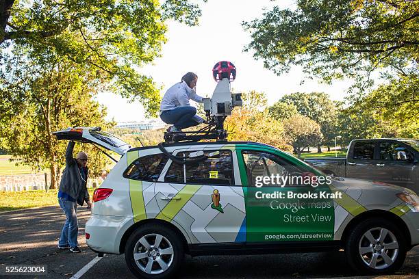 Google employee drives thru Arlington National Cemetery with the Street View car, equipped with 15 cameras. Each lens points in a different...