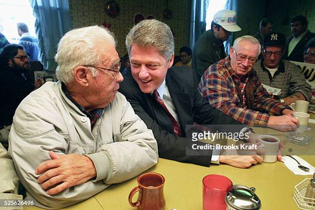 Bill Clinton campaigns at a diner in New Hampshire during his first presidential campaign.