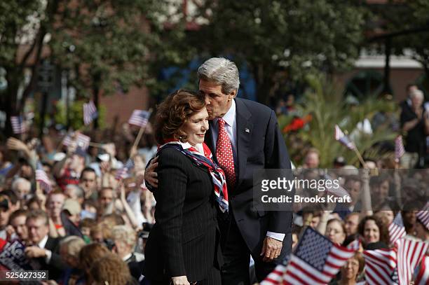 Presumed Democratic presidential candidate Senator John Kerry pauses to speak to his wife Teresa Heinz Kerry during a rally in downtown Pittsburgh,...