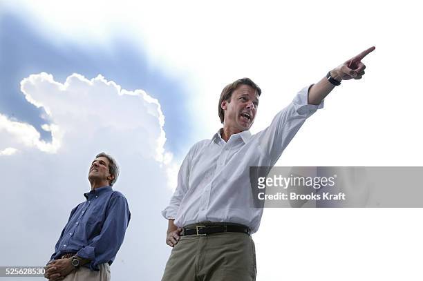Democratic presidential nominee Senator John Kerry and his running mate Senator John Edwards attend a rally in Raleigh, North Carolina.