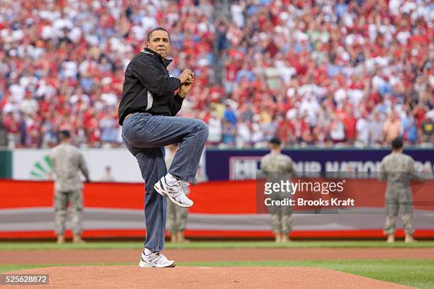 President Barack Obama throws out the ceremonial first pitch prior to Major League Baseball's All-Star game in St. Louis.