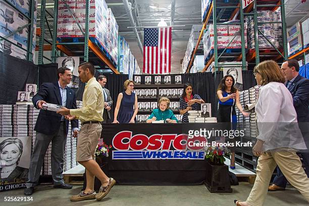 Former Secretary of State Hillary Clinton attends a signing her new book, 'Hard Choices: A Memoir,' at Costco in Arlington, VA. Clinton is on a...