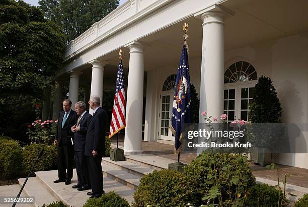 President George W Bush speaks about the release of the September 11th Commission's final report, in the Rose Garden at the White House, in...