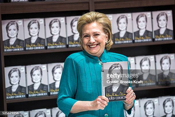 Former Secretary of State Hillary Clinton attends a signing her new book, 'Hard Choices: A Memoir,' at Costco in Arlington, VA. Clinton is on a...