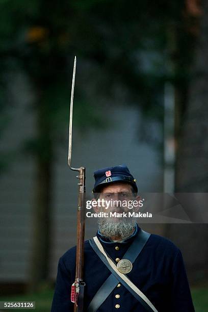 Union soldier guards Union Generals addressing a crowd on the second day of the 149th Gettysburg Reenactment in Gettysburg, Pennsylvania on July 7,...