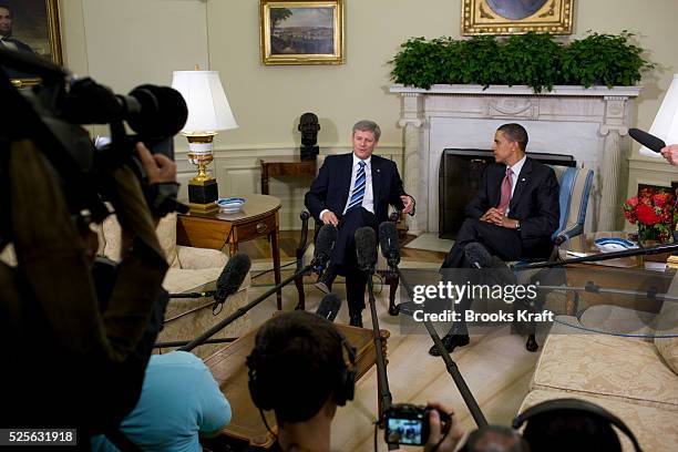 President Barack Obama meets with Canada's Prime Minister Stephen Harper in the Oval Office at the White House in Washington.