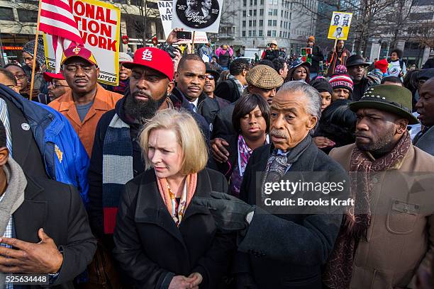 Rev. Al Sharpton leads the 'Justice For All' march in Washington. Thousands of marchers descended on the nation's capital to demand justice for black...