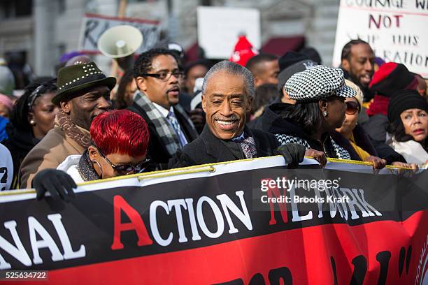 Rev. Al Sharpton leads the 'Justice For All' march in Washington with the families of Eric Garner, Michael Brown, Tamir Rice, Trayvon Martin, and...