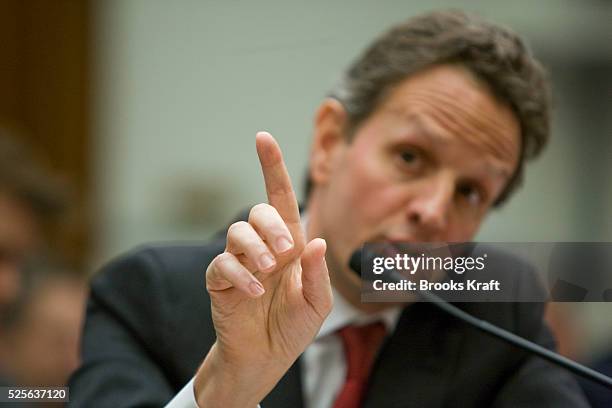 Treasury Secretary Timothy Geithner testifies on Capitol Hill in Washington before the House Oversight and Government Reform Committee hearing on AIG.