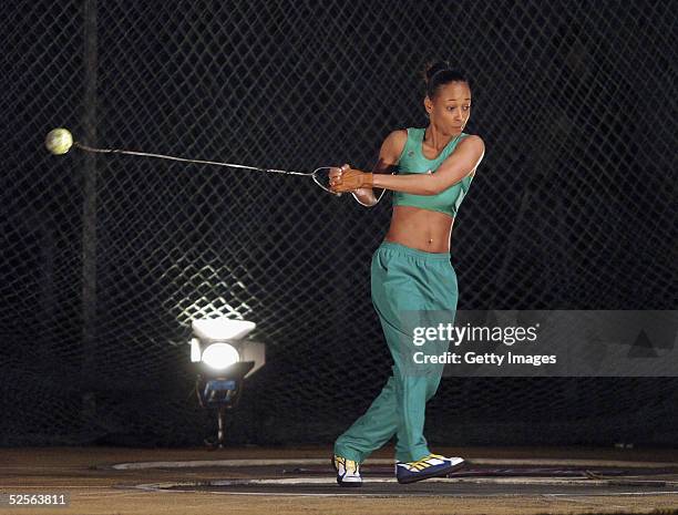 Lisa Maffia of the girls participates in the hammer event on day eight of the new series of the reality TV show The Games, at the Don Valley Stadium...