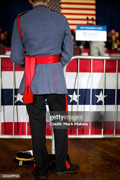 Cadet waits before a Republican Presidential candidate Mitt Romney victory rally at Valley Forge Military Academy in Wayne, Pennsylvania on September...