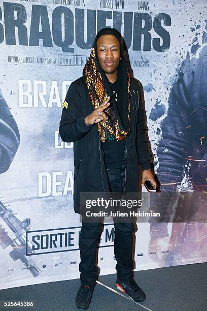 Mokobe attends 'Braqueurs' Premiere at UGC Cine Cite des Halles on April 28, 2016 in Paris, France.