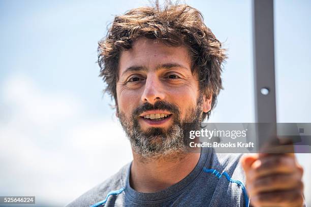 Sergey Brin, co-founder of Google, and Director of Google X and Special Projects, attends an event debuting the new Google self driving car outside...