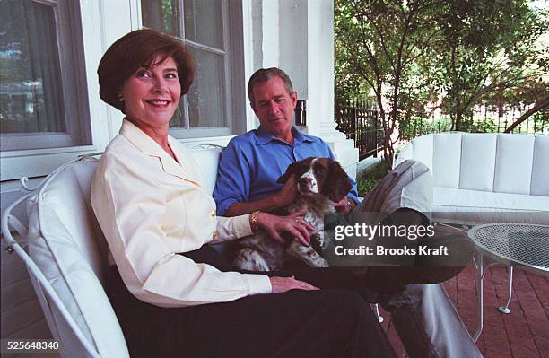 George W. And Laura Bush with their dog Spot.